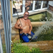 Emptying Alligator pond and watering the plants at the same time